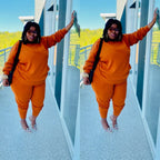 Plus size women's casual two-piece outfit featuring a stylish top and matching pants from Trendy Attic Store01.