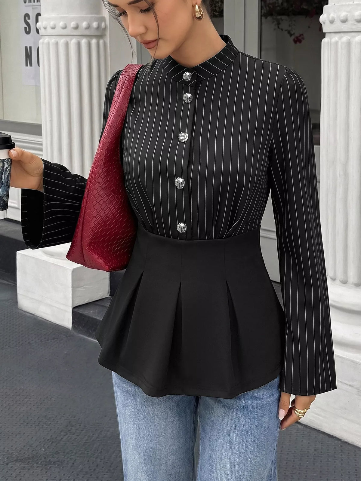 Striped long sleeve peplum blouse for women by Trendsi, featuring a stylish pattern and feminine fit.