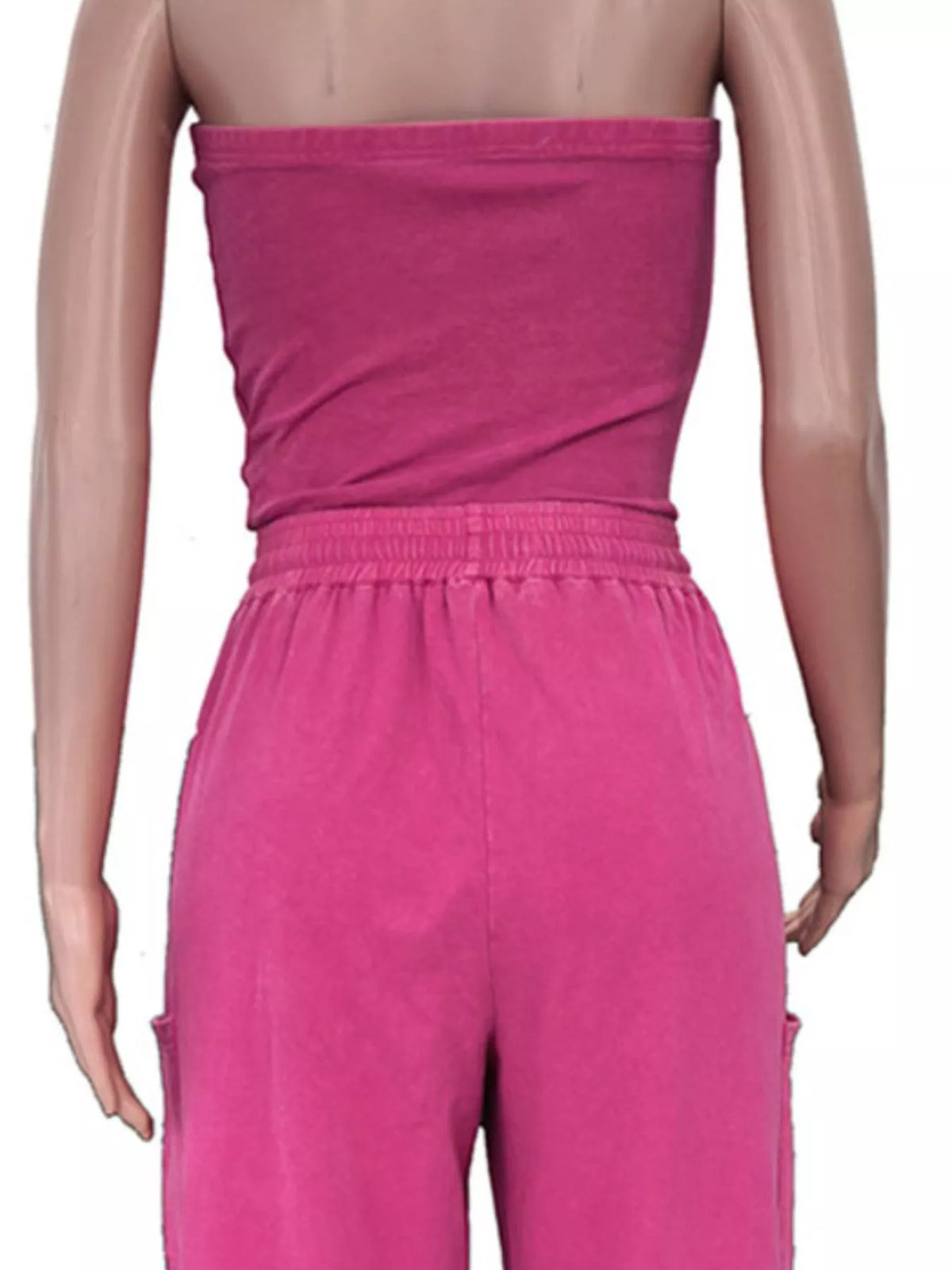 Drawstring strapless wide-leg jumpsuit by Trendsi, featuring a relaxed fit with a cinched waist and flowing wide-leg design.