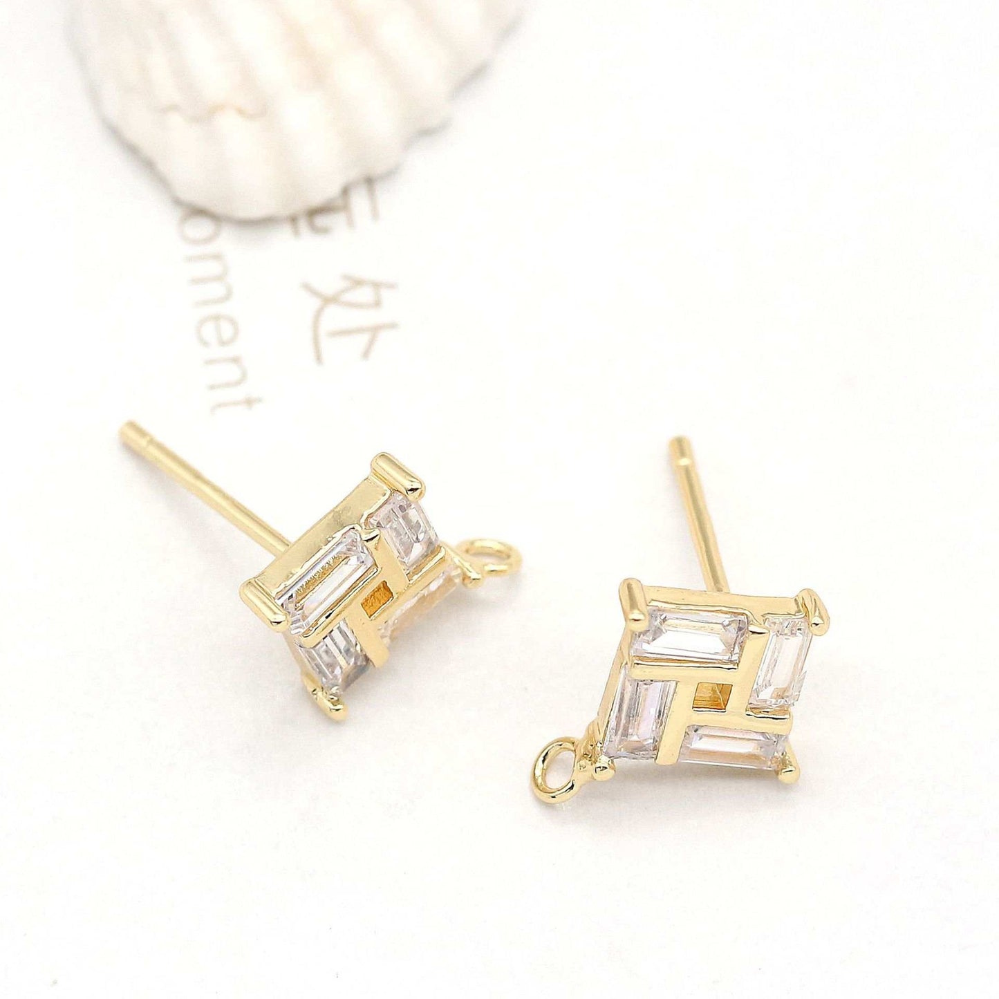 Stone Plated 14K Real Gold EarringsExperience the luxurious beauty of our Stone Plated 14K Real Gold Earrings. The mirror polishing technology and hand-polished 925 silver needle ensure excellent shinearingsPlush Fashions ShopPlush Fashion Shop