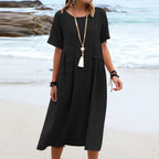Women's casual cotton linen short-sleeve midi dress by Plush Fashion Hub, shown in a relaxed fit with a flowy silhouette.