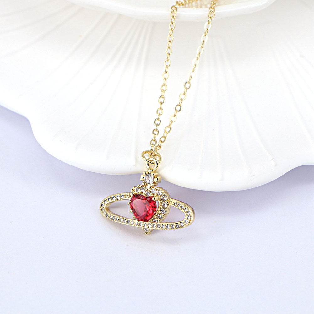 Ladies Fashion Personality Zircon Love Necklace with red heart-shaped pendant on gold chain.