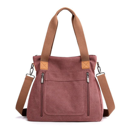 Women Large-capacity Canvas Casual Shoulder BagsBe stylish and organized with our Women's Large-capacity Canvas Casual Shoulder Bags. Made with soft canvas fabric, this bag is perfect for business or casual outingHandbagsPlush Fashions ShopPlush Fashion Shop