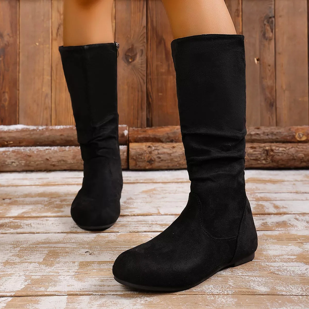 Round toe side zip boots from Trendsi featuring sleek design and sturdy sole, ideal for stylish everyday wear.