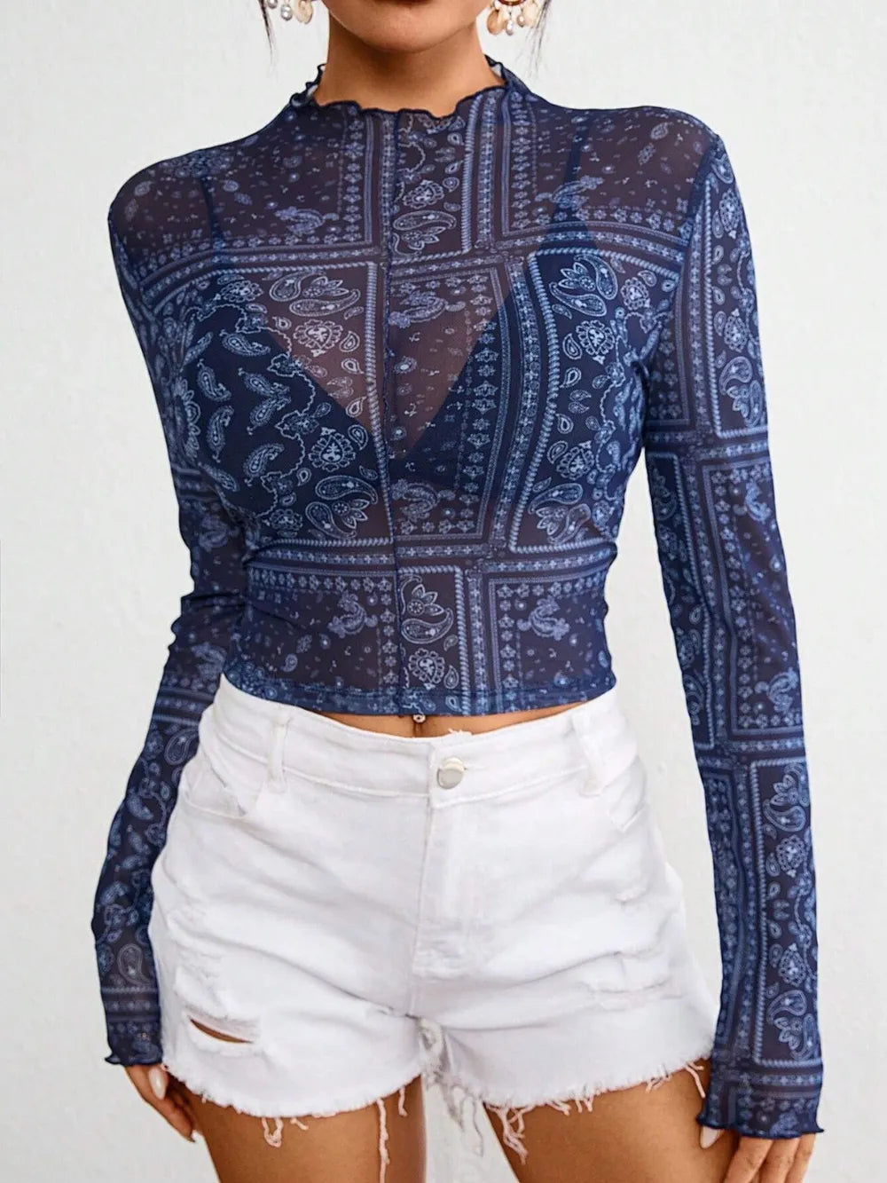 Sheer paisley print mock neck long sleeve top from Plush Fashion Hub, showcasing a fitted design with a delicate pattern.