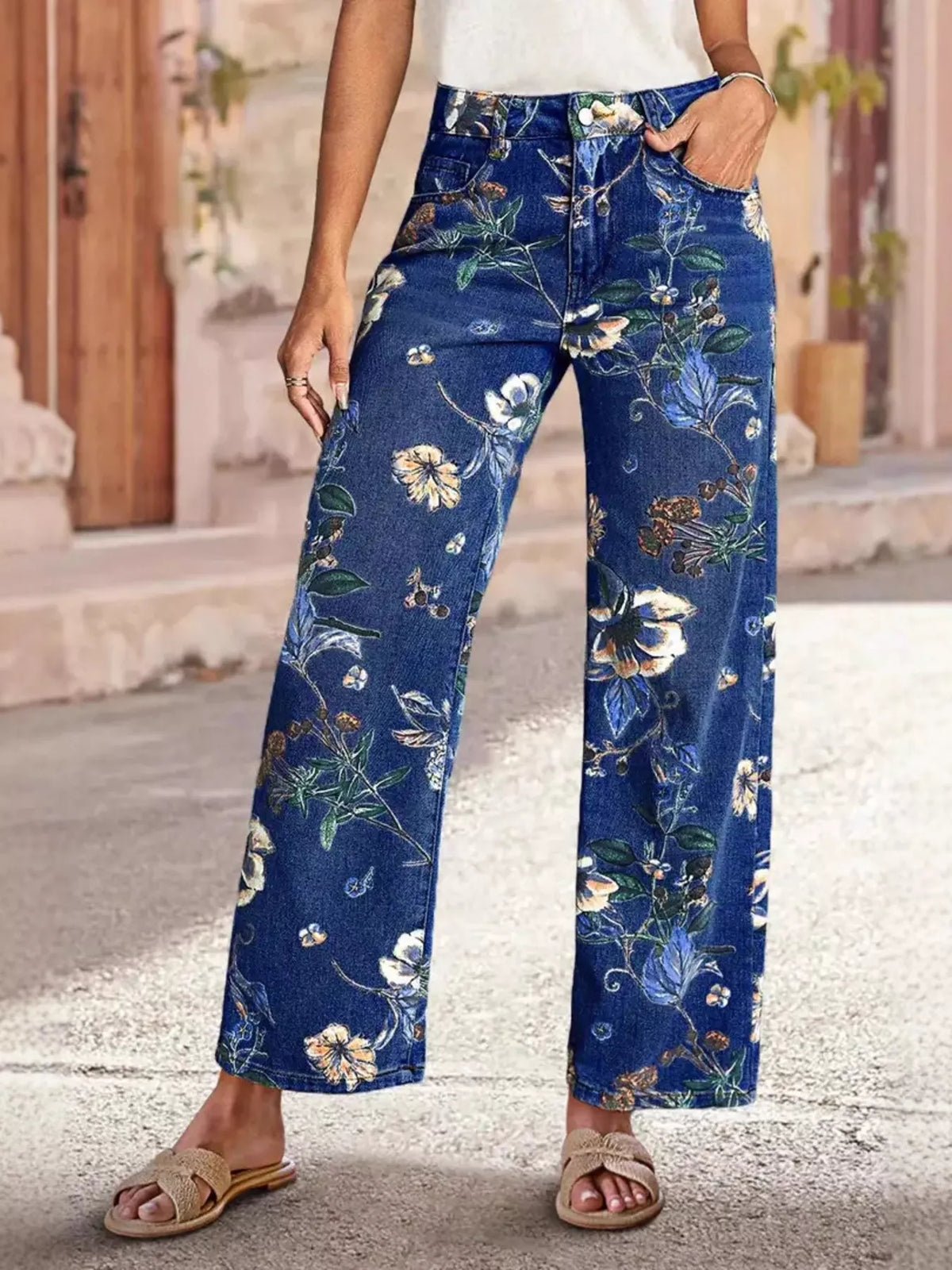 Floral print wide-leg jeans from Plush Fashion Hub featuring a vibrant floral pattern and relaxed fit for casual wear.