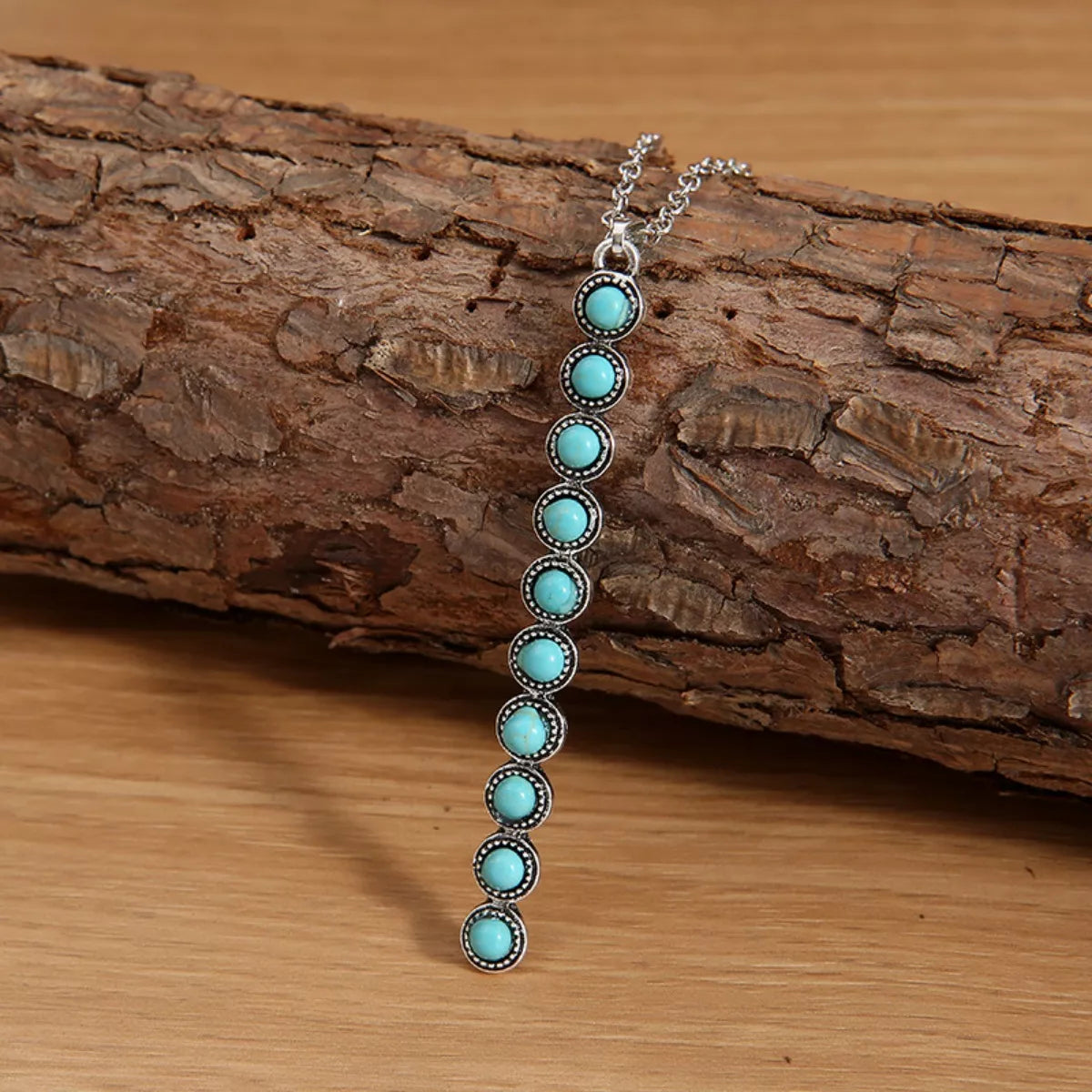 Vintage style beaded bar necklace from Plush Fashion Hub featuring colorful beads and a sleek bar pendant.