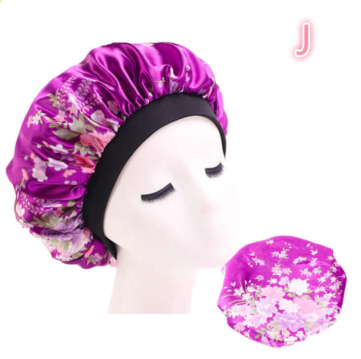 Beauty print Satin silk Bonnet sleep night capTransform your sleep routine with our Beauty print Satin silk Bonnet! Made with a luxurious blend of polyester and spandex, this bonnet is perfect for all seasons. SBonnetPlush Fashion ShopPlush Fashion ShopBeauty print Satin silk Bonnet sleep night cap