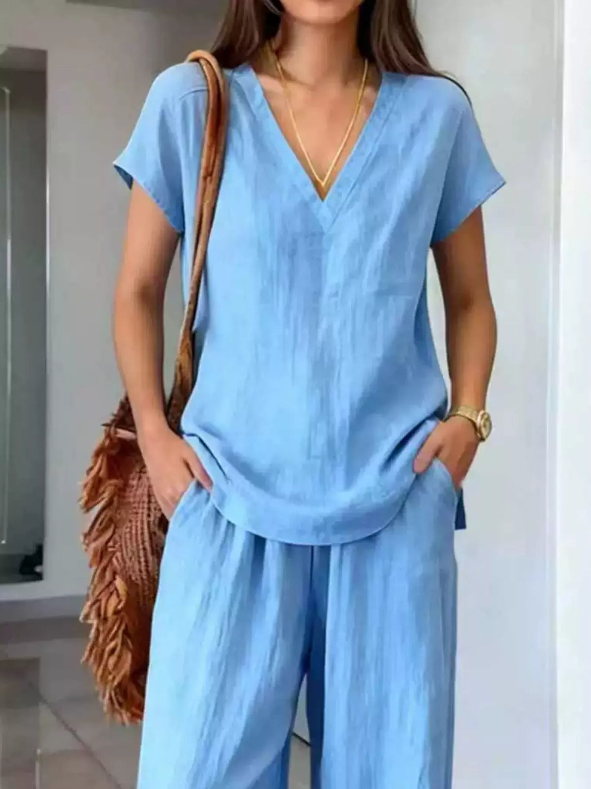 Plus size v-neck short sleeve lounge set with matching pants by Plush Fashion Hub, comfortable full-length loungewear for relaxed wear.