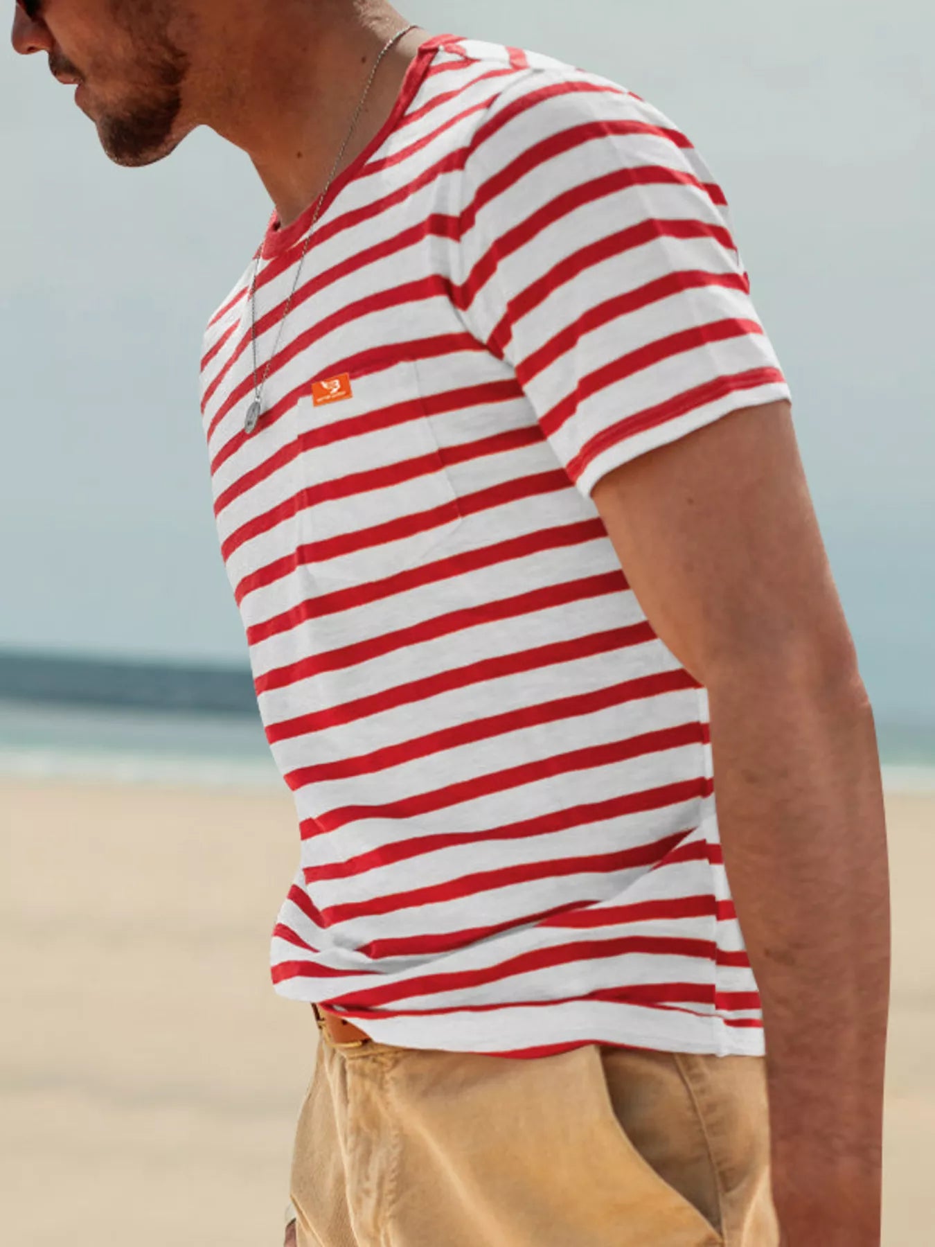 Men's plus size striped pocket short sleeve T-shirt by Trendsi, featuring a classic design and front chest pocket.