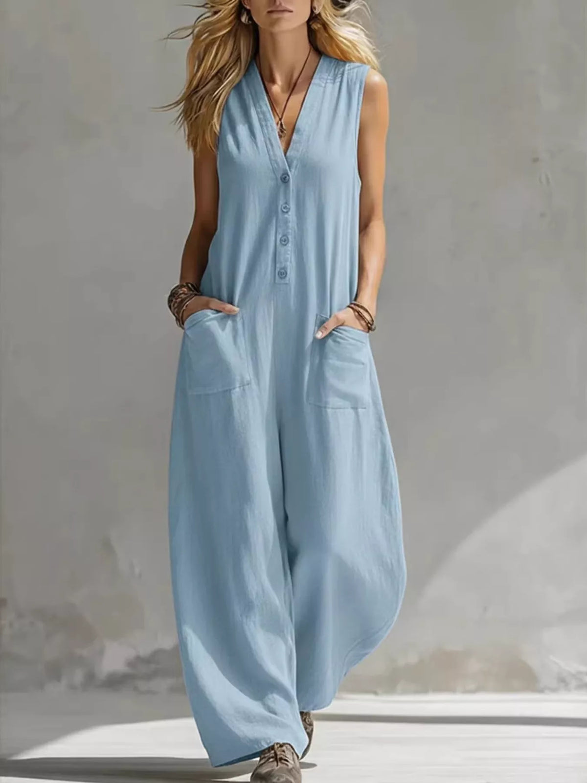 Plus size Plush Fashion Hub sleeveless V-neck jumpsuit with wide-leg design, full length, and comfortable fit.
