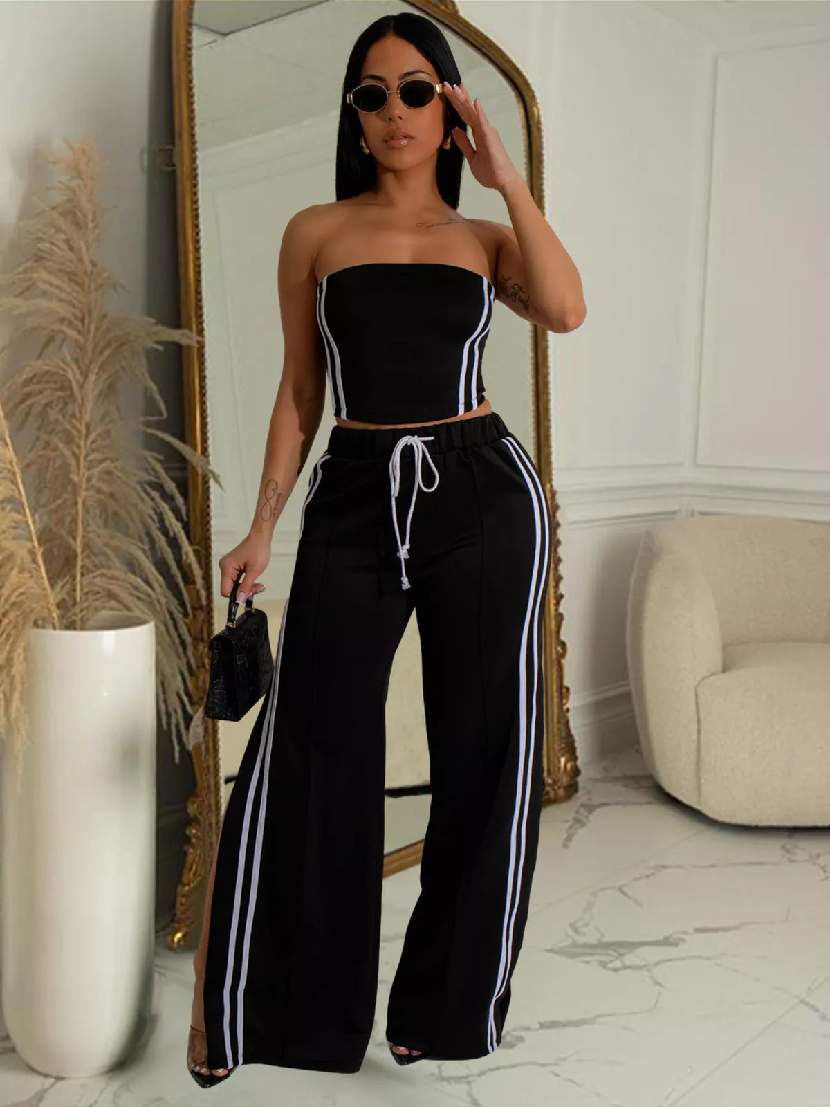Sleeveless tube top and wide-leg pants set by Plush Fashion Hub, stylish casual outfit with fitted tube top and flowy pants.