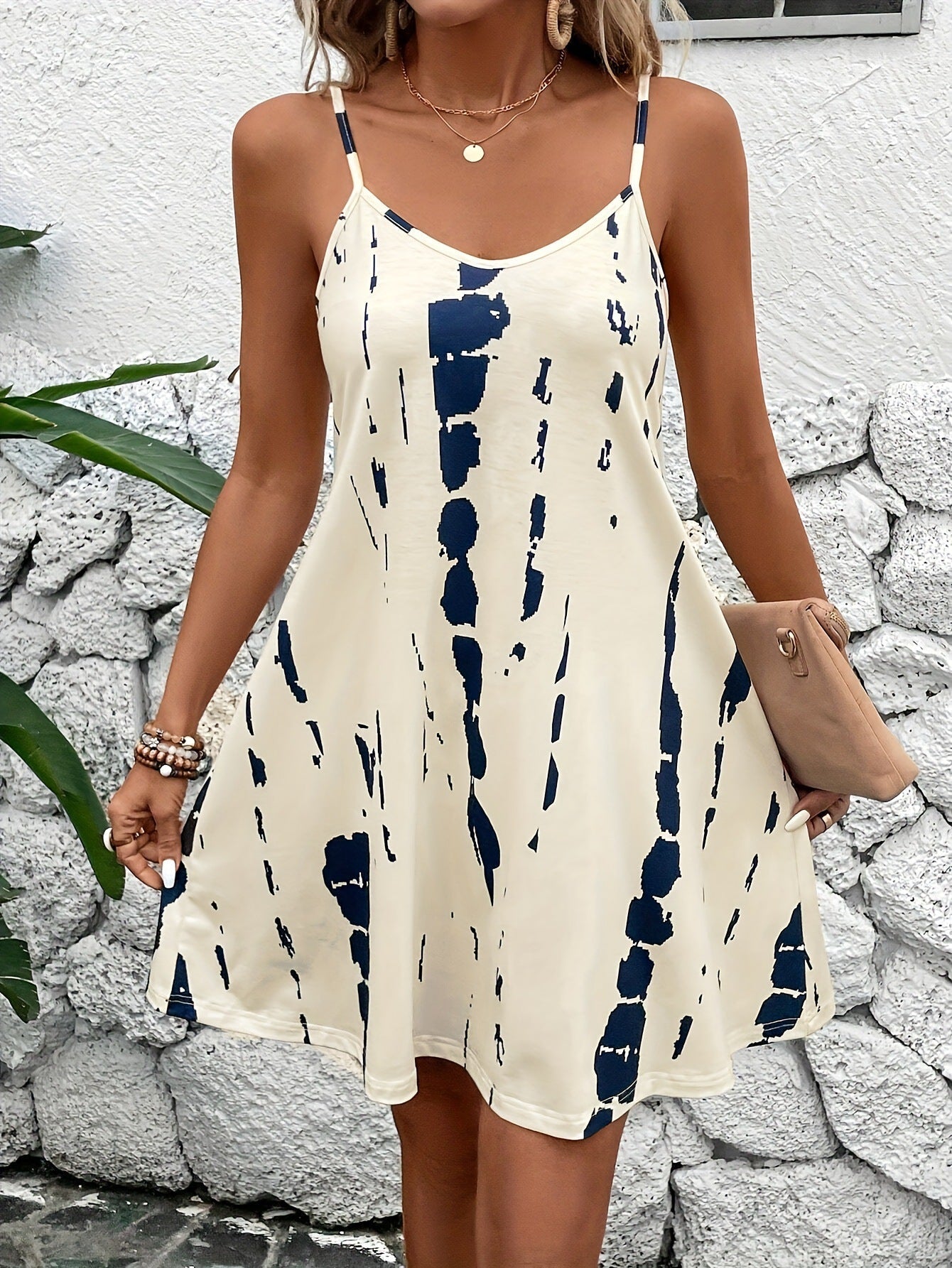 Plus size women's summer halter dress by FitiqueFit in various colors, featuring a flowy, sleeveless design for warm weather.