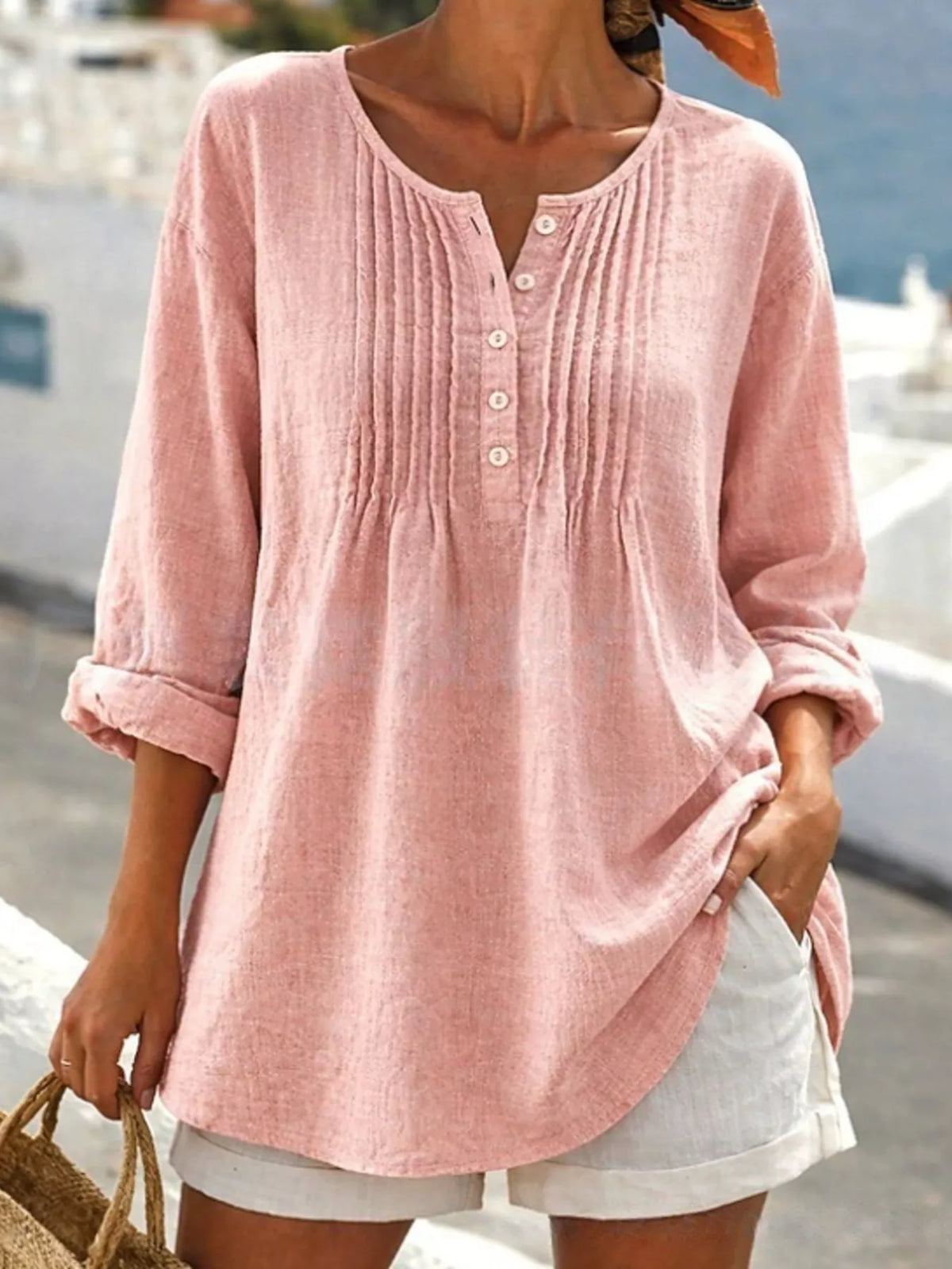 Casual linen shirt with button details, long sleeves, in a relaxed fit, by Trendsi, displayed on a model.
