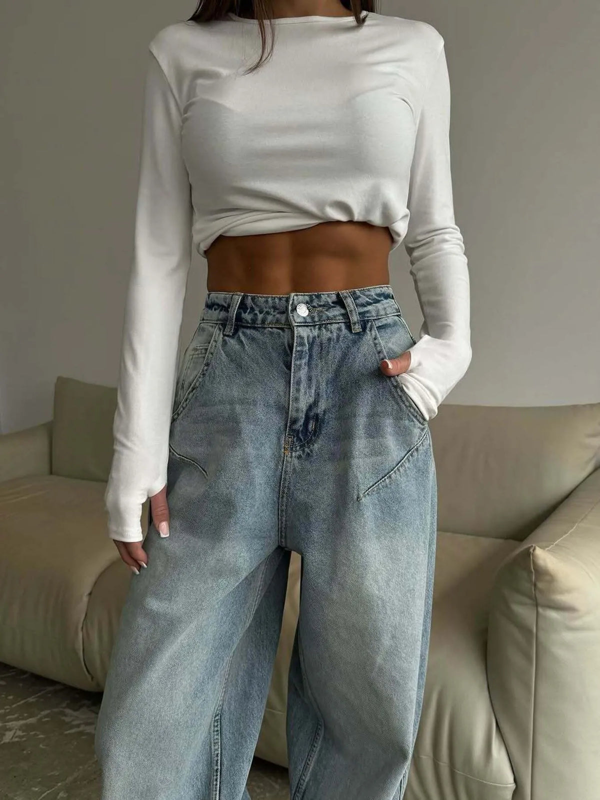 Plush Fashion Hub wide leg denim jeans with classic five-pocket design and light blue wash, displayed on a neutral background.
