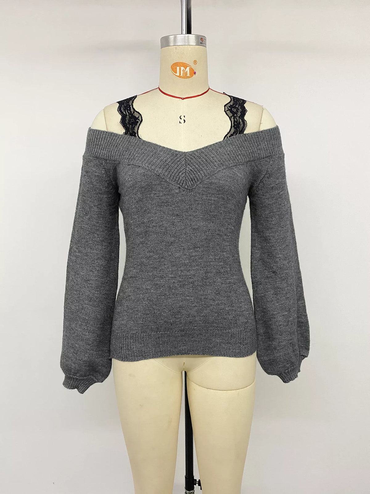 Off-shoulder lace trim sweater from Plush Fashion Hub, featuring a stylish off-shoulder design and delicate lace details.