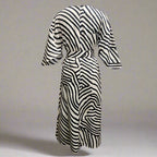 Plush Fashion Hub geometric print batwing sleeve flowy maxi dress in XS to XXXL, casualwear style with a flowing silhouette.