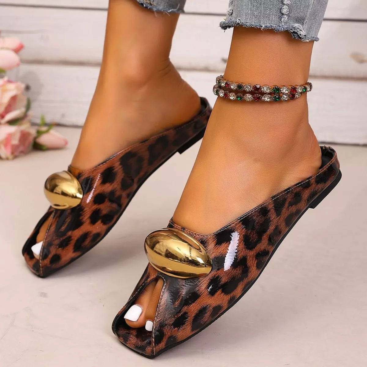 Plush Fashion Hub leopard open toe sandals with plush straps and open heel, stylish and comfortable for warm weather.