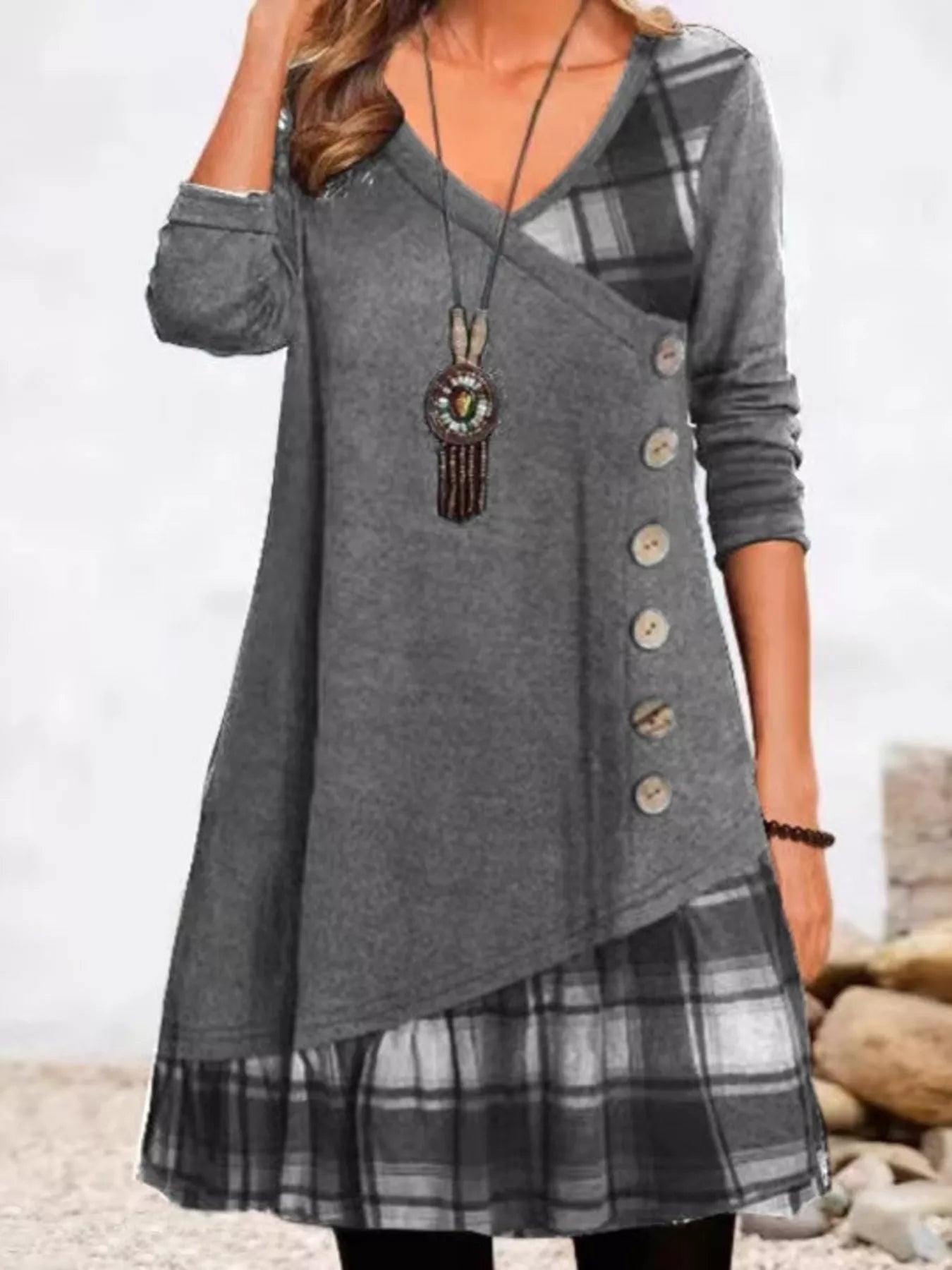 Plus size asymmetrical plaid patchwork long sleeve dress by Trendsi, featuring a stylish design and full-coverage fit.