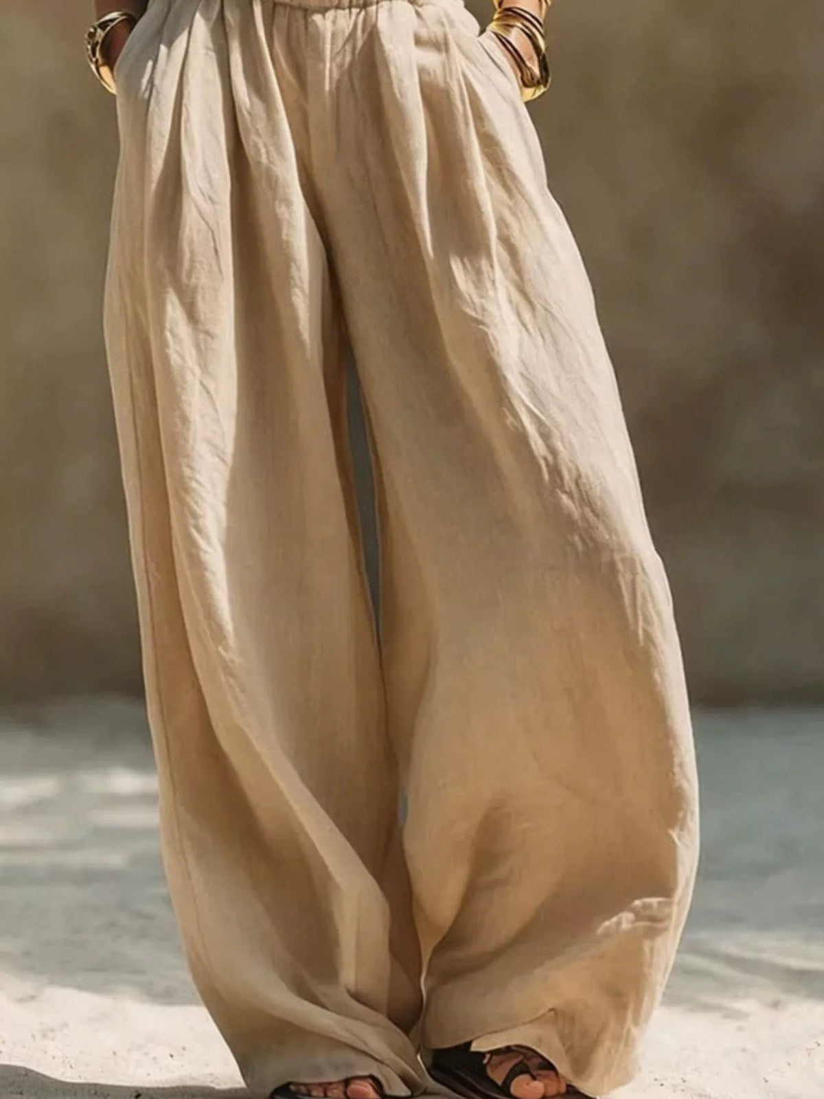 Plus size wide leg pants with full elastic waistband, made by Trendsi, featuring a flowy, comfortable fit and stylish silhouette.
