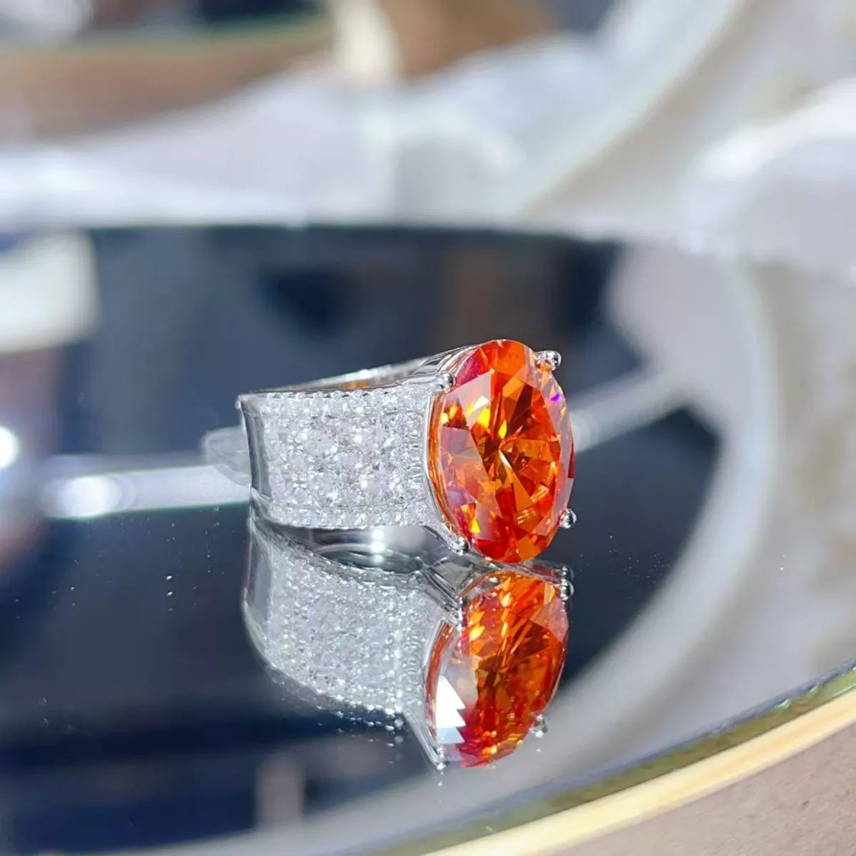 Sterling silver ring with 8-carat moissanite gemstone, featuring a sleek and elegant design, by Plush Fashion Hub.