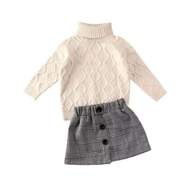 Turtleneck sweater + plaid skirt suitThis elegant suit features a turtleneck sweater and plaid skirt, perfect for any occasion. Long sleeves provide warmth, while the cotton fabric guarantees comfort. WGirls 2 piece setPlush Fashions ShopPlush Fashion Shop