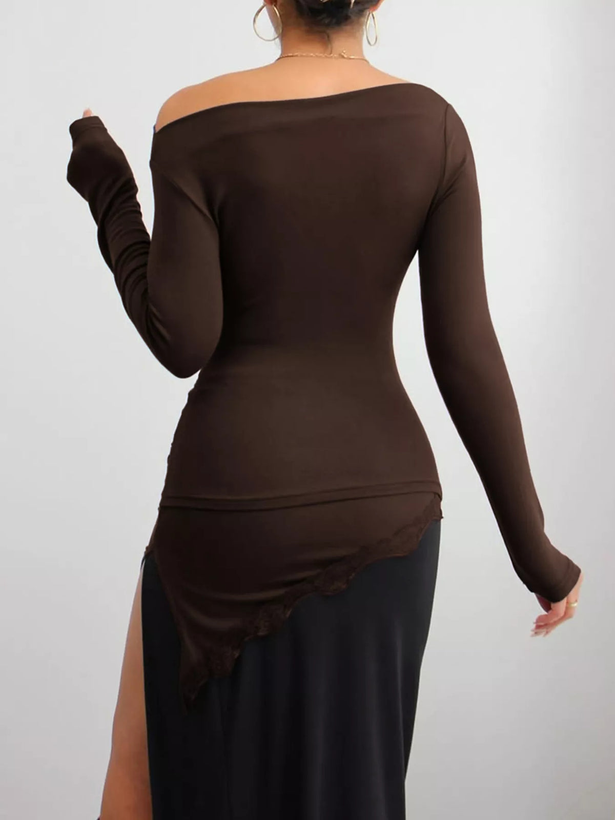 Asymmetrical one-shoulder ruched T-shirt with lace trim, stylish shirt by Trendsi, featuring a unique shoulder design and delicate lace details.