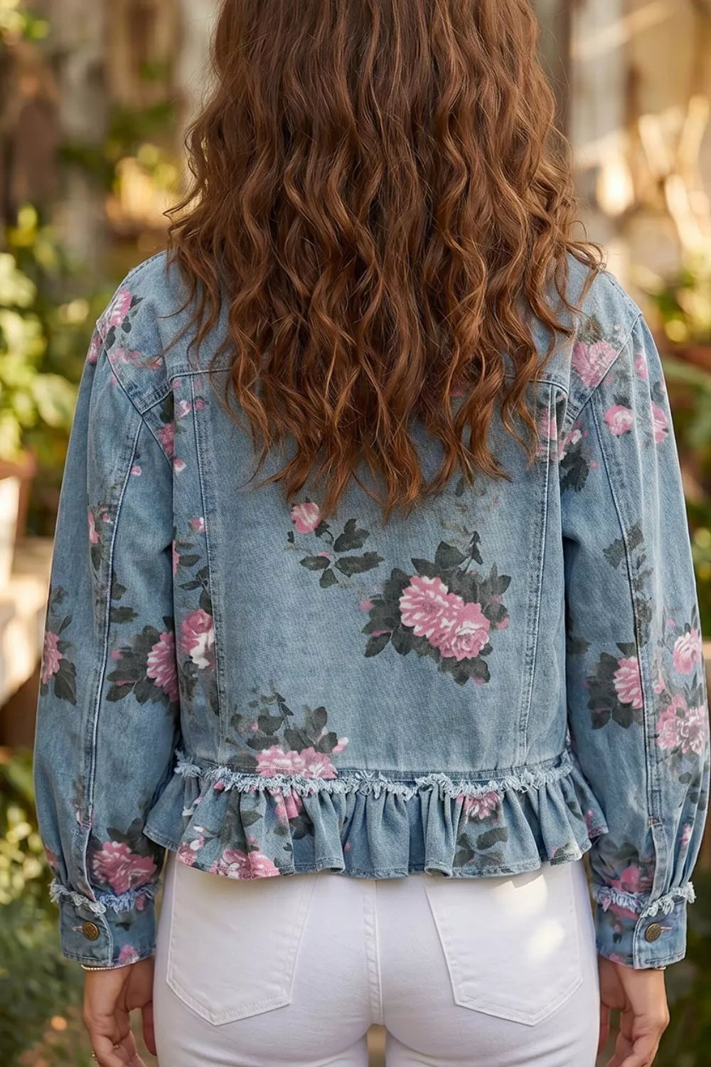 Floral print denim jacket with ruffled hem from Plush Fashion Hub, featuring colorful flower patterns and stylish ruffle details.