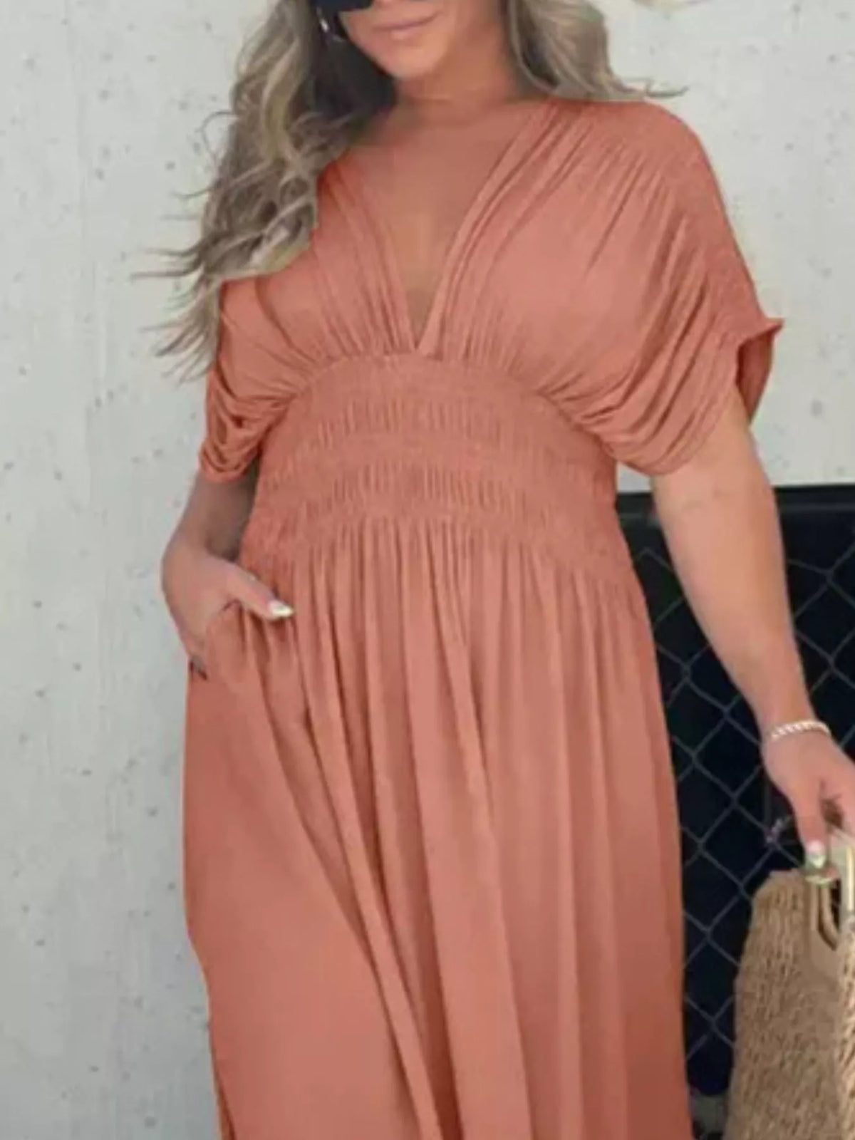 Plus size full slit V-neck maxi dress with smocked waist from Plush Fashion Hub, featuring flowing fabric and stylish design.