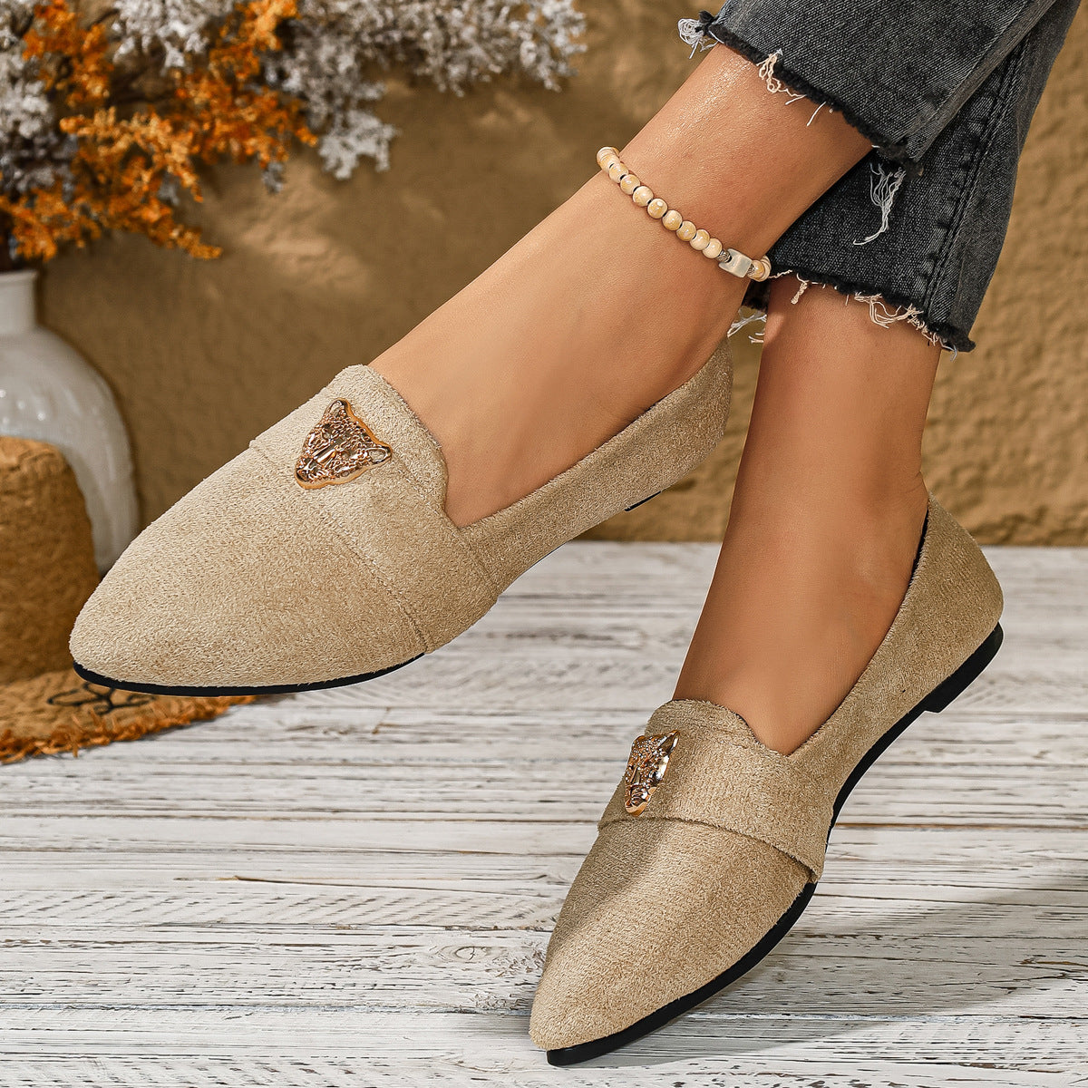 Point toe slip-on footwear by Trendsi featuring sleek design and comfortable fit, perfect for casual or dressy occasions.