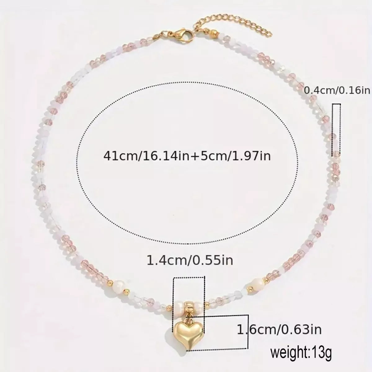Bead heart pendant necklace by Plush Fashion Hub featuring a delicate beaded heart charm on a matching necklace chain.