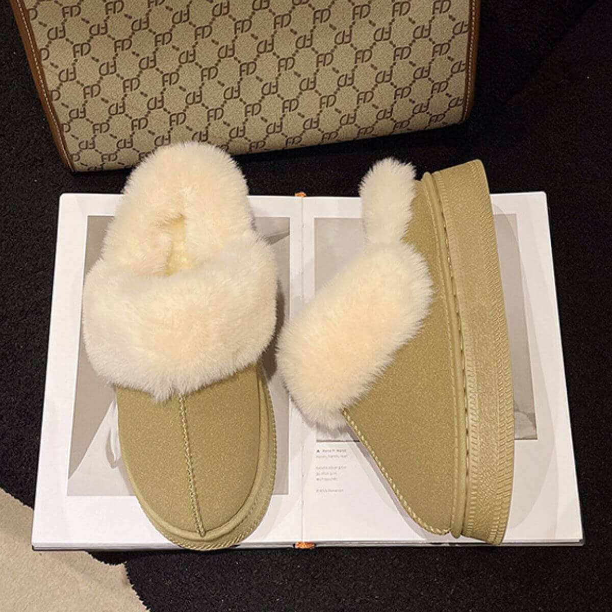 Suede Soft round toe platform slippers with faux fur and suede finish.