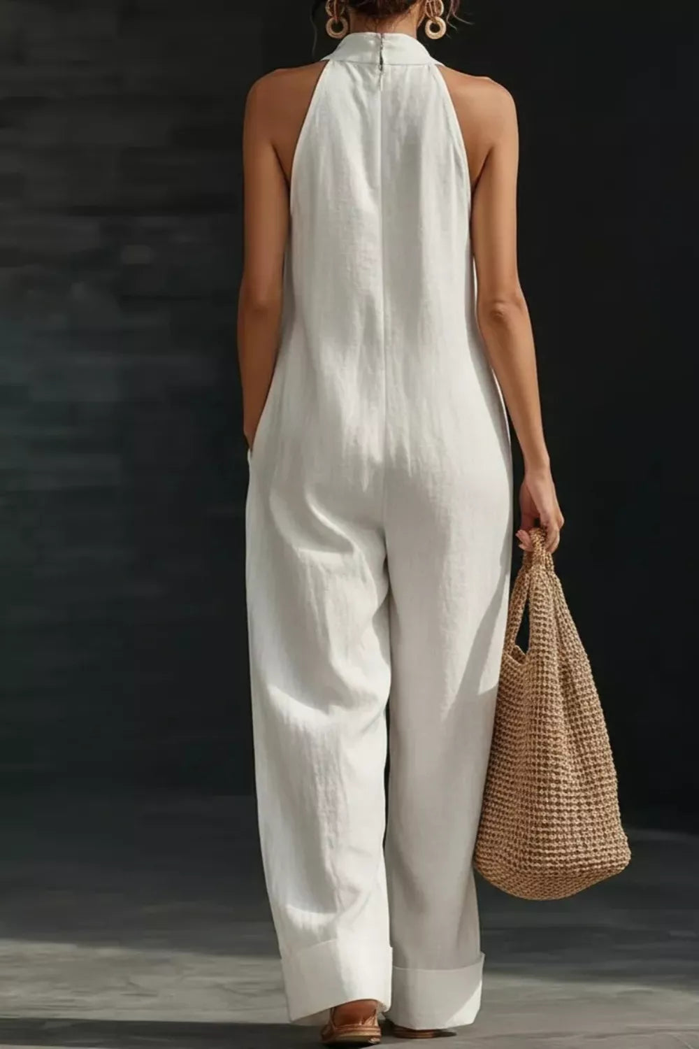 Women's sleeveless wide-leg jumpsuit by Plush Fashion Hub with pockets, casual romper, stylish and comfortable for everyday wear.