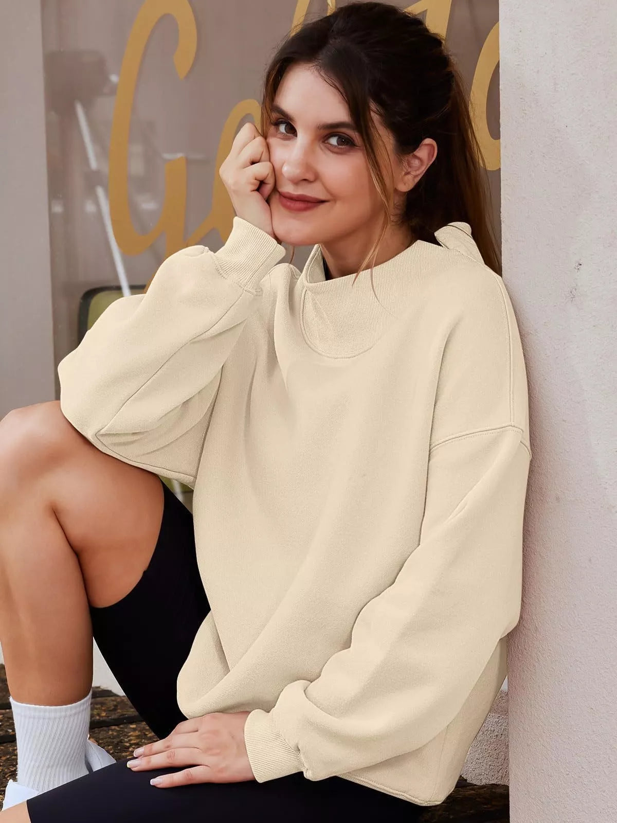 Women’s oversized plush fashion hub mock neck sweatshirt with dropped shoulders, casual pullover top in soft fabric.