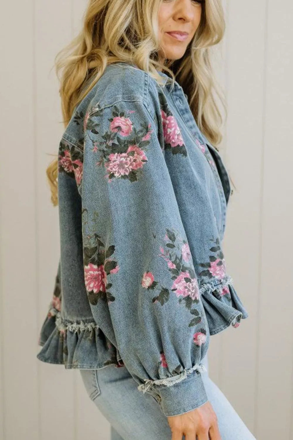 Floral print denim jacket with ruffled hem from Plush Fashion Hub, featuring a stylish design and colorful floral pattern.