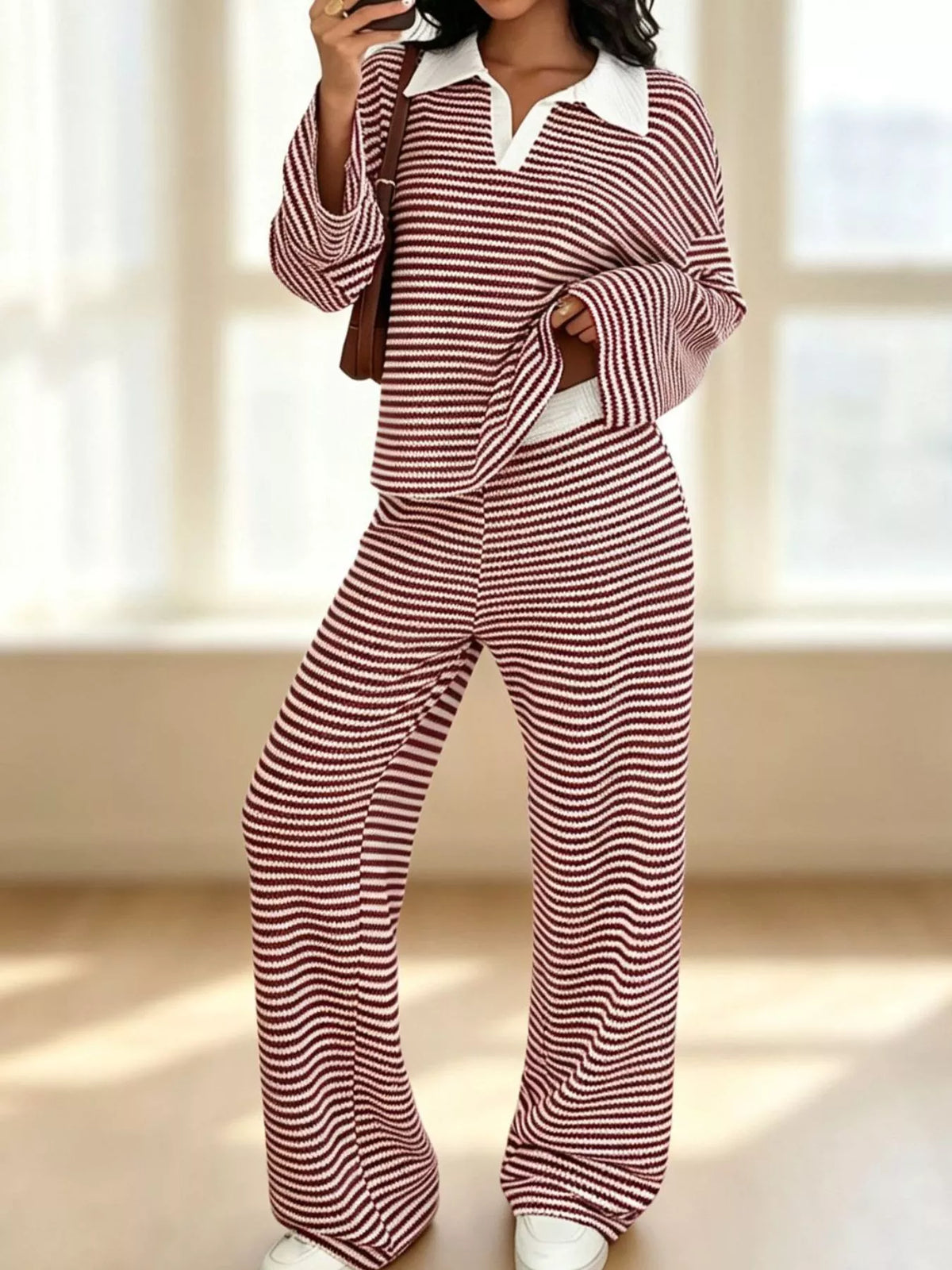 Striped long sleeve polo and wide-leg pants set by Trendsi, featuring a stylish coordinated outfit with bold stripes and comfortable fit.