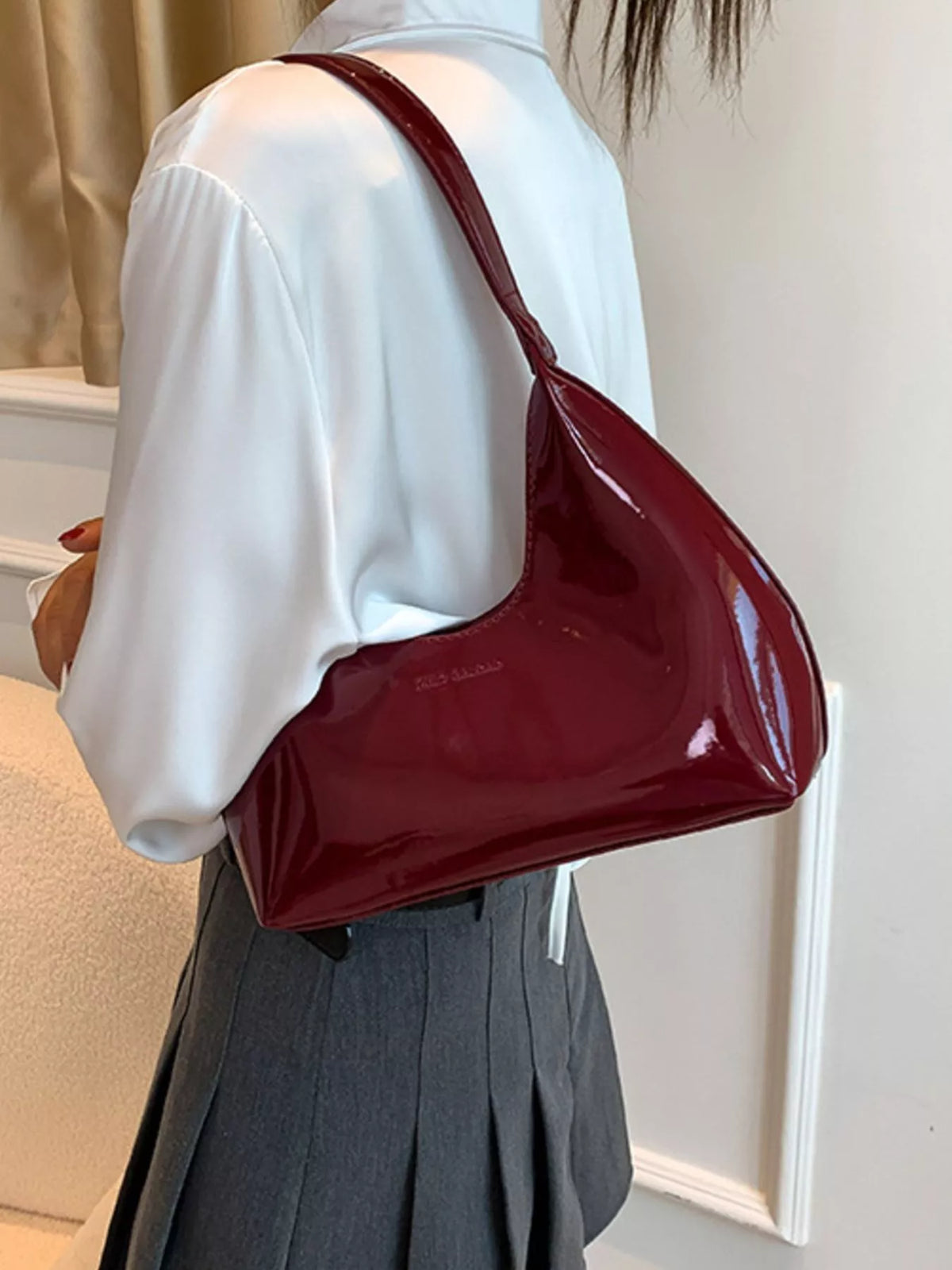 Trendsi PU leather shoulder handbag with adjustable strap and spacious interior, stylish accessory for everyday use.