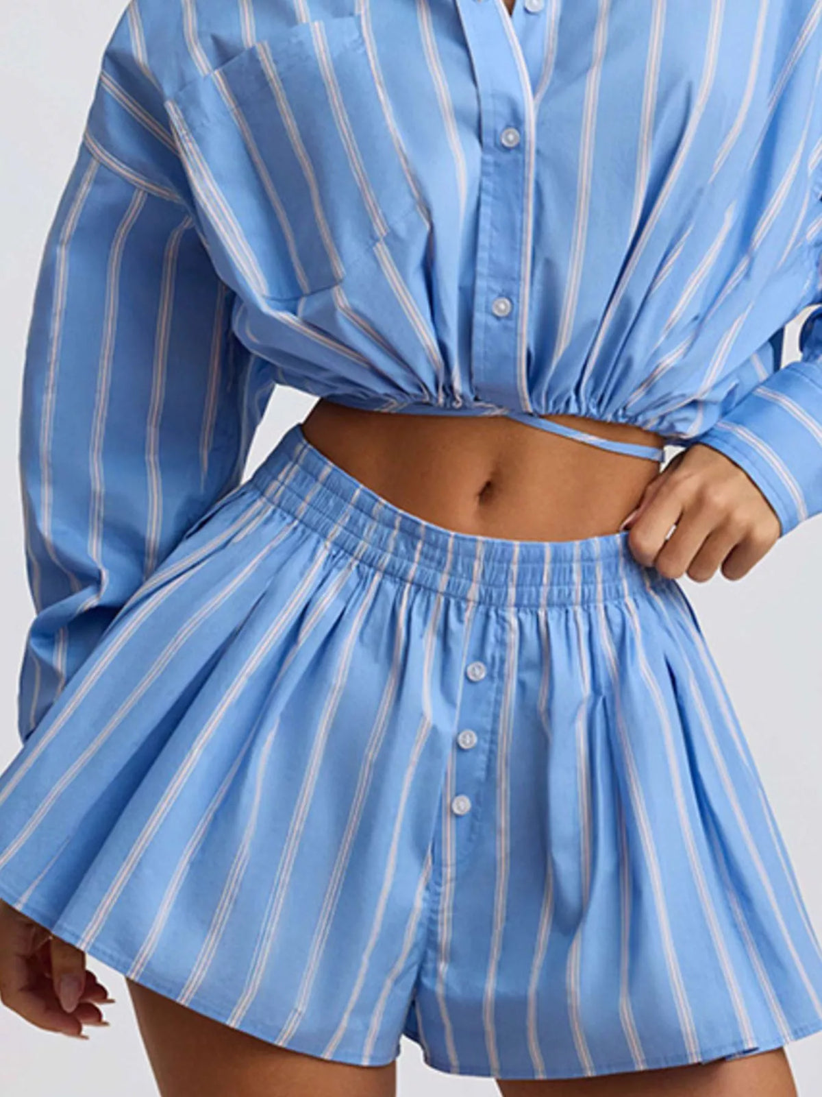 Striped button-up shirt and shorts loungewear set by Plush Fashion Hub, featuring casual fit and relaxed style.