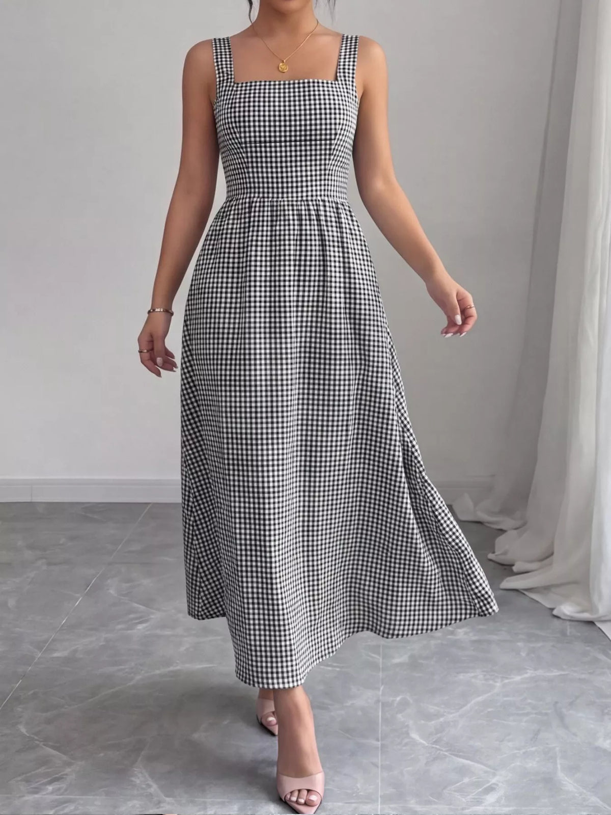 Square neck gingham midi dress by Plush Fashion Hub featuring a fitted bodice and flared skirt in black and white check pattern.