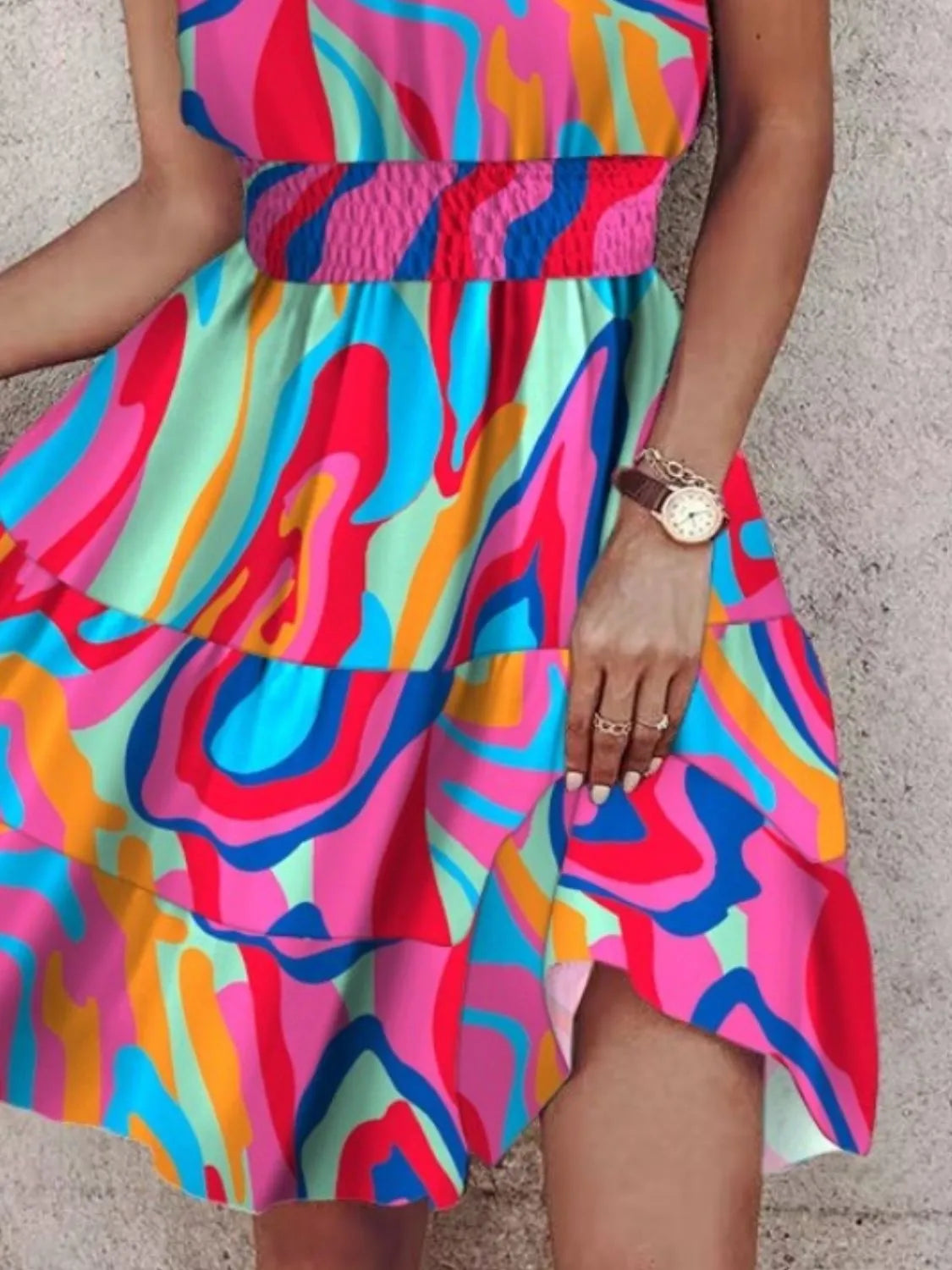 Paisley print halter neck mini dress by Plush Fashion Hub, featuring a stylish sleeveless design and vibrant pattern.