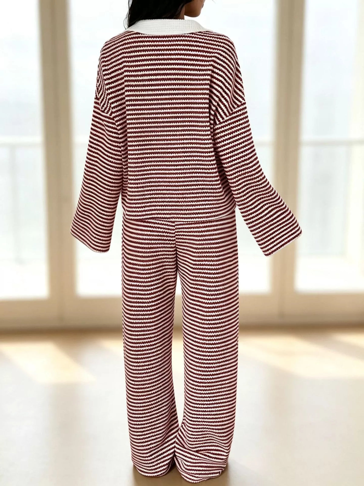 Striped long sleeve polo and wide-leg pants set by Trendsi, featuring a stylish coordinated outfit with bold stripes and comfortable fit.