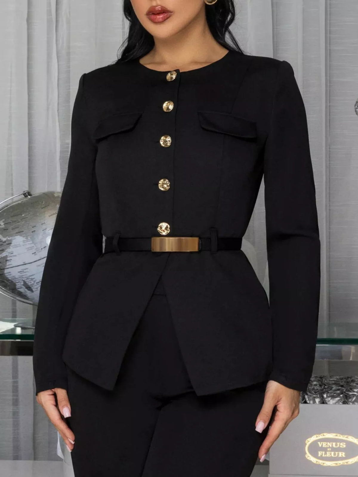 Women's long sleeve button-up top and pants set by Trendsi, featuring a stylish coordinated outfit with a comfortable fit.