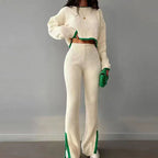 Women’s casual color-block two-piece set by FitiqueFit, featuring a stylish top and matching pants in vibrant colors.