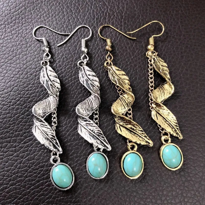 Turquoise alloy leaf earrings with intricate design, crafted by Plush Fashion Hub, perfect for stylish accessory wear