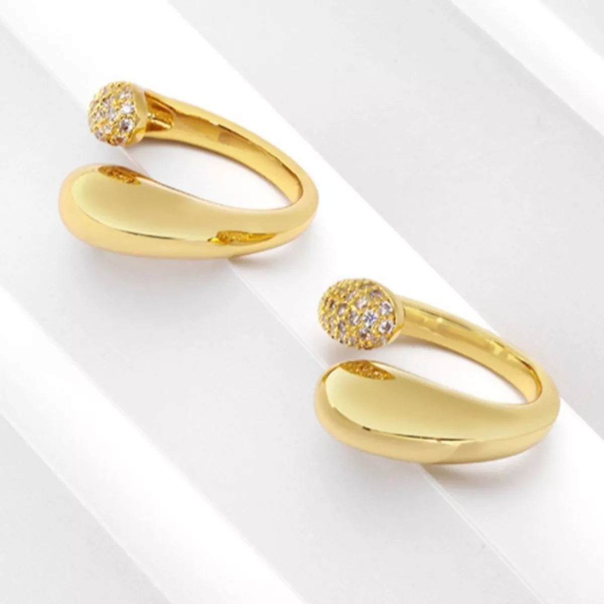18K gold-plated open ring with sleek design, showcasing a shiny, polished finish and modern style from Plush Fashion Hub.