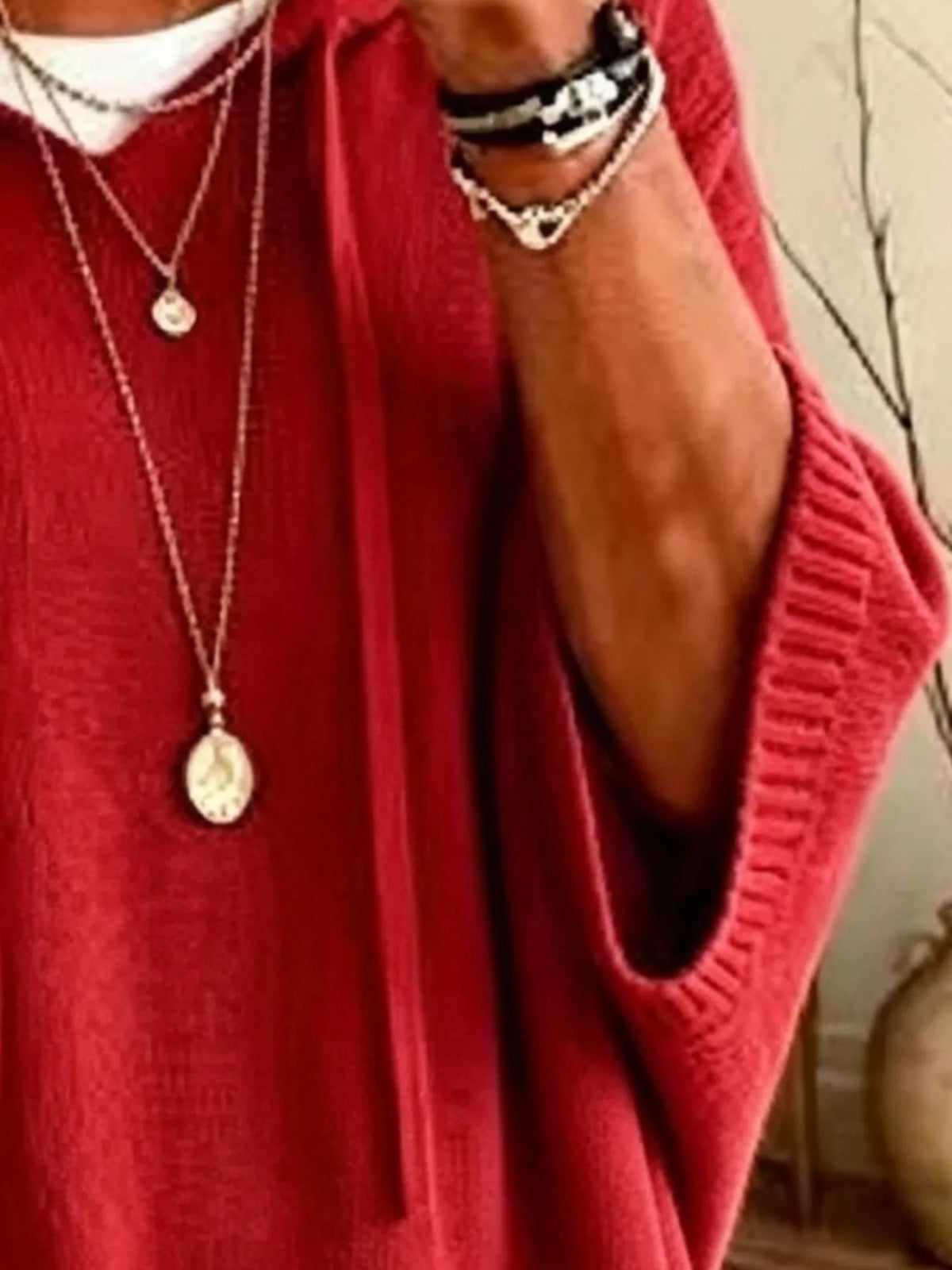 Plus size full-length hooded sweater with drawstring and 3/4 sleeves by Trendsi, shown in a relaxed fit on a model.