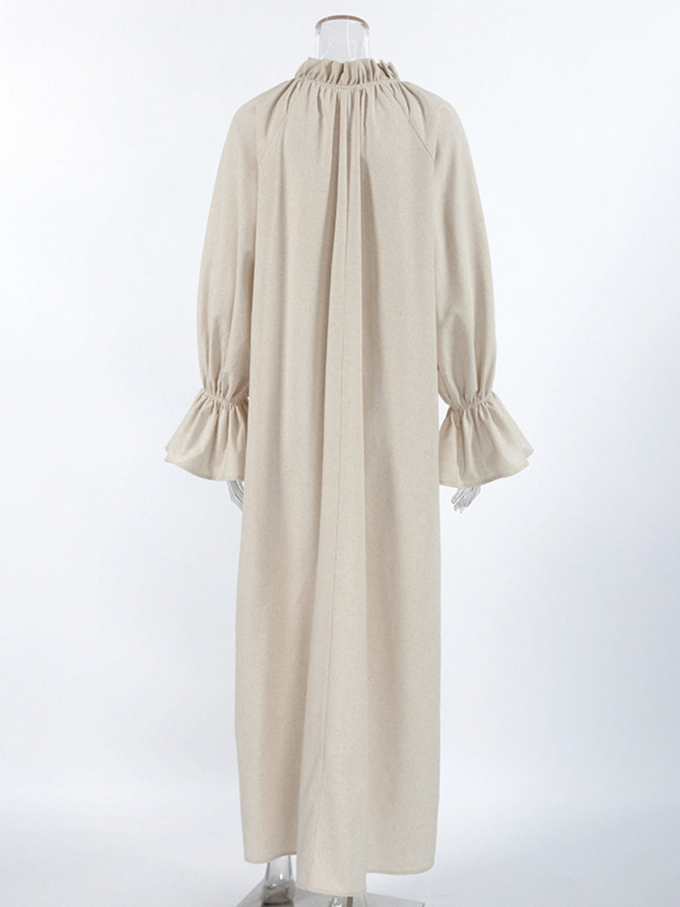 Cotton linen maxi dress with tie neck and flounce sleeves from Trendsi, featuring a flowing silhouette and casual elegance.