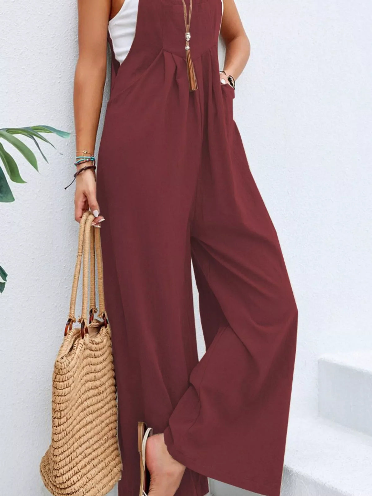 Full size casual wide-leg jumpsuit with pockets by Plush Fashion Hub, showing the relaxed fit and stylish design.