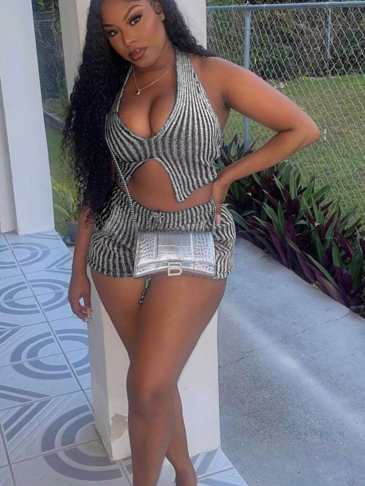 Plush Fashion Hub halter neck sweater top and matching shorts two-piece set, casual and stylish for warm-weather wear.