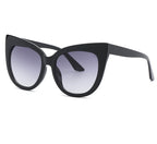 Women's oversized cat eye sunglasses from Plush Fashion Hub with UV400 protection, stylish black frames and tinted lenses.